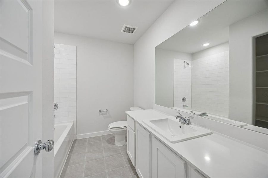 Bathroom in the Oak II home plan by Trophy Signature Homes – REPRESENTATIVE PHOTO Bathroom in the Oak II home plan by Trophy Signature Homes – REPRESENTATIVE PHOTO