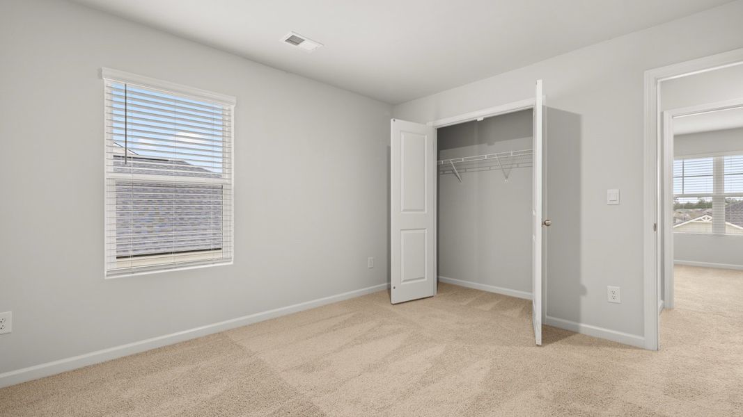 Representative unfurnished interior of a home built from the Halton by D.R. Horton in Highland Hills, Graniteville (Image 29).