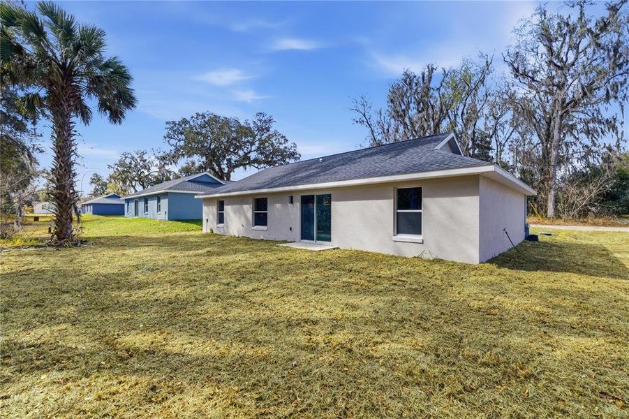 Exterior details and patio area of a home in , Summerfield (Image 15).