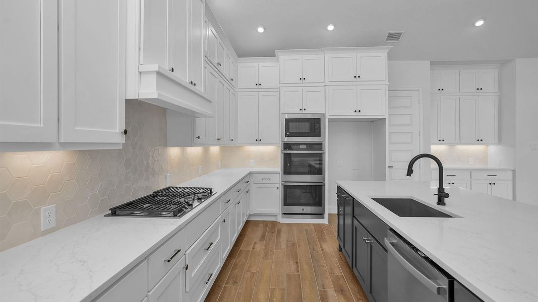 Furnished interior view inside a new home in Meridiana 70', Manvel (Image 4). Furnished interior view inside a new home in Meridiana 70', Manvel (Image 4).