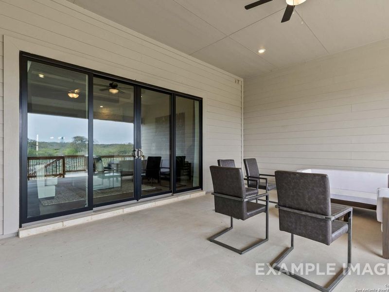 Exterior details and patio area of a home in Potranco Oaks, Castroville (Image 22).