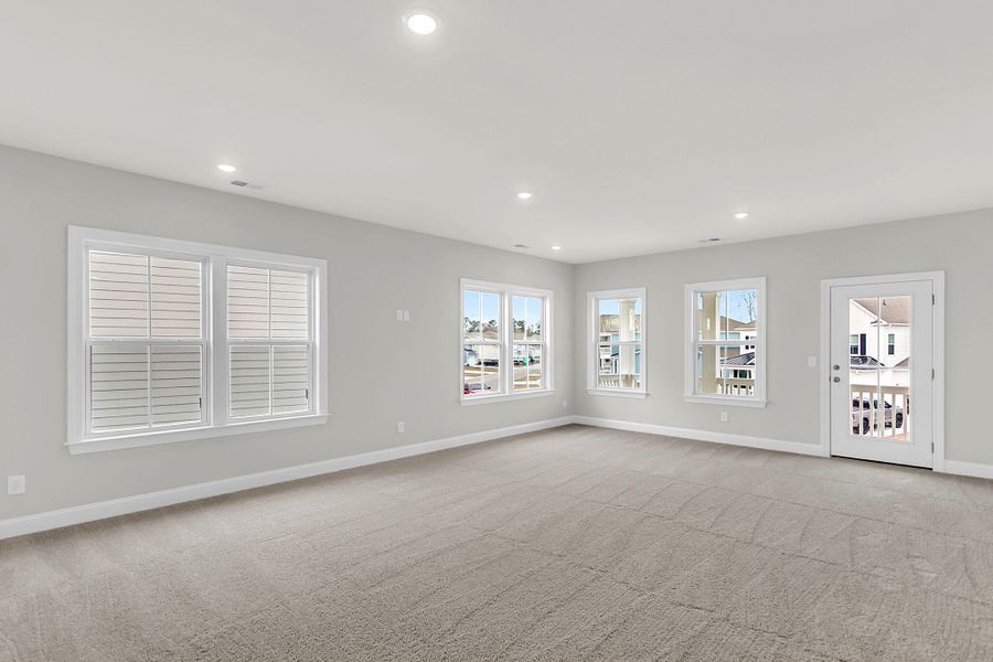 Spacious, unfurnished interior of a new home in Tidewater at Lakes of Cane Bay, Summerville (Image 27).