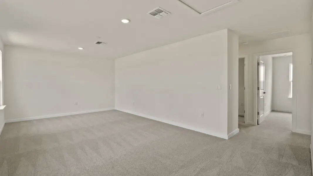 The Naples Second Floor Loft Space in Quick Move-In Home at Willowbrook North by DRB Homes in Winter Haven, FL