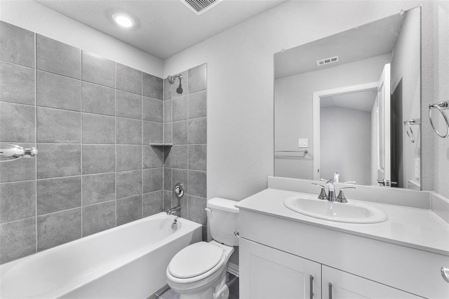 Bathroom with vanity and bathtub / shower combination Bathroom with vanity and bathtub / shower combination