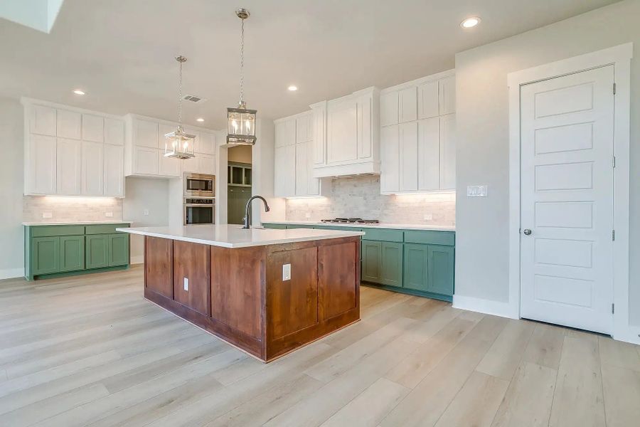 Representative furnished interior of a home built from the The Landry by Elmwood Custom Homes in Ranch at Stone Hill, Waxahachie (Image 21). Representative furnished interior of a home built from the The Landry by Elmwood Custom Homes in Ranch at Stone Hill, Waxahachie (Image 21).