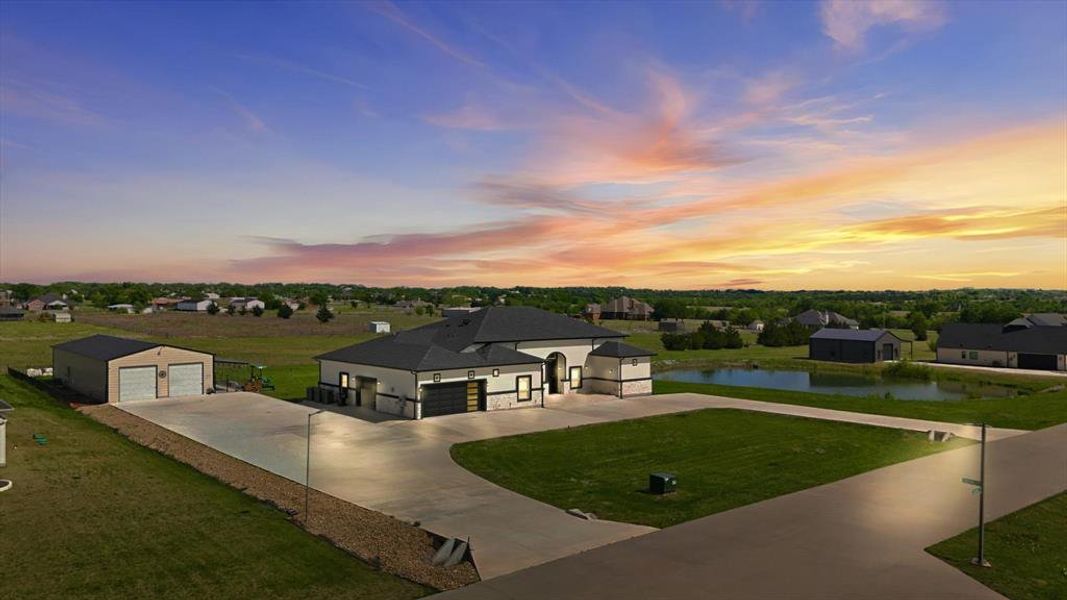 Oversized One Story Home with Vaulted Ceilings on 2.47 Acres with a Pond, 7 Car Garage & a Separate In Law Suite:)