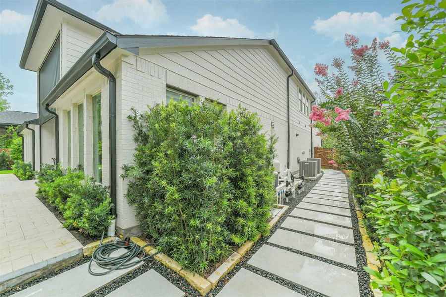 Exterior details and patio area of a home in Woodforest – 60', Montgomery (Image 23).