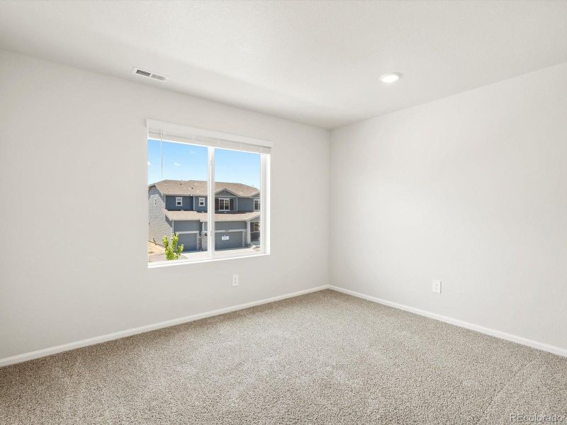 Spacious, unfurnished interior of a new home in Poudre Heights: The Lakes Collection, Windsor (Image 28).