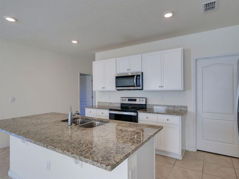 Furnished interior view inside a new home in Cascades, Davenport (Image 8). Furnished interior view inside a new home in Cascades, Davenport (Image 8).