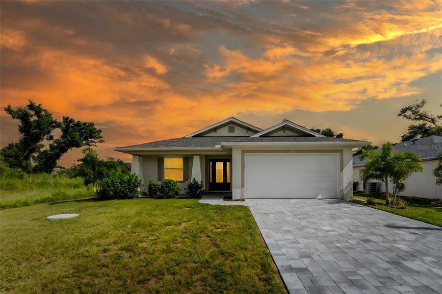 Front exterior of a new home in , Rotonda West, FL, highlighting curb appeal (Image 29). Front exterior of a new home in , Rotonda West, FL, highlighting curb appeal (Image 29).