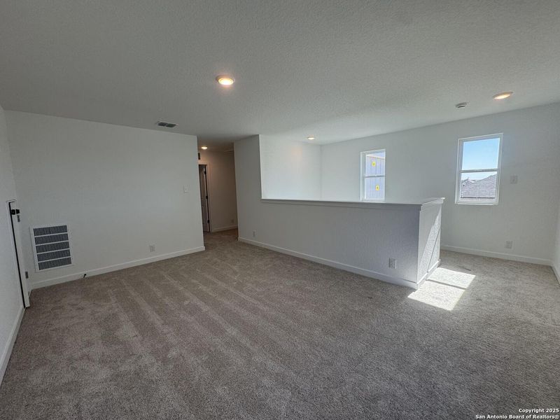 Spacious, unfurnished interior of a new home in Enclave at Hennersby Hollow 50's, San Antonio (Image 27).