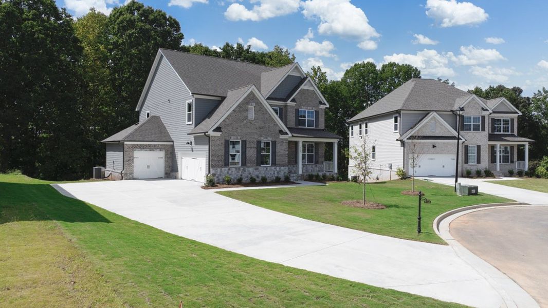 Representative exterior photo of a completed home built from the Bellview by D.R. Horton in Thalley Creek Estates, Cumming, GA (Image 2).