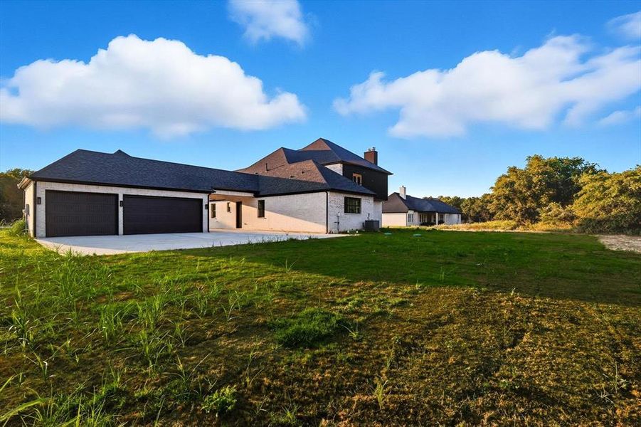 Front exterior of a new home in , Weatherford, TX, highlighting curb appeal (Image 19). Front exterior of a new home in , Weatherford, TX, highlighting curb appeal (Image 19).