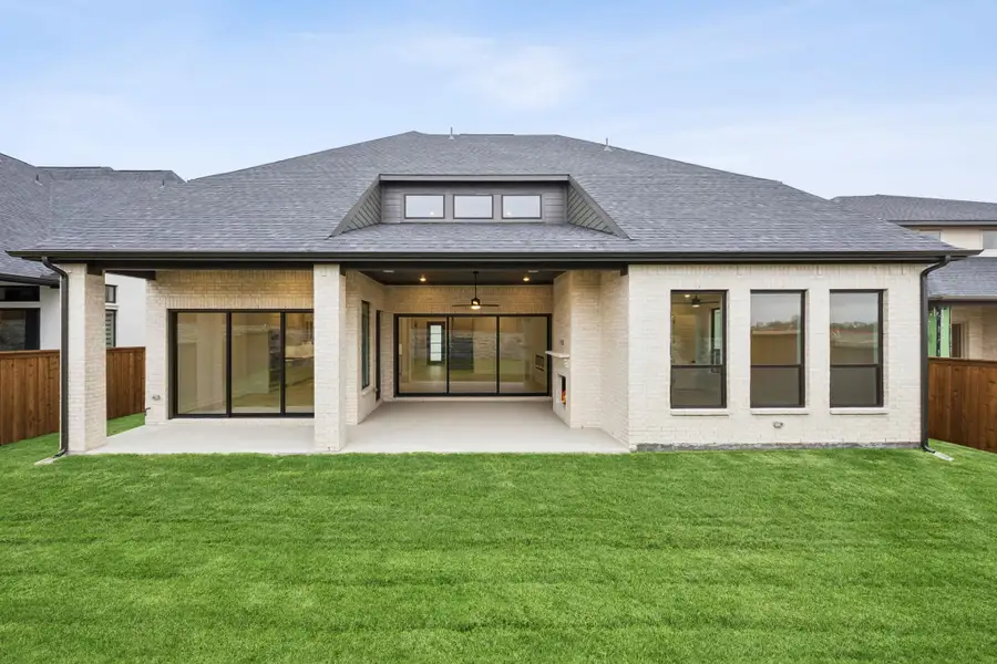 Exterior details and patio area of a home in Canyon Falls 70s, Argyle (Image 4).