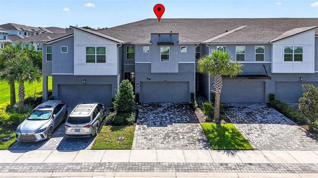 Front exterior of a new home in , Lutz, FL, highlighting curb appeal (Image 29).