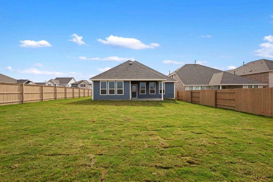 Exterior details and patio area of a home in The Colony 50s, Bastrop (Image 29).