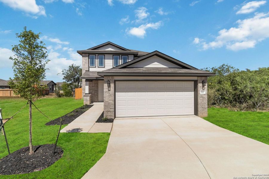 Front exterior of a new home in Applewhite Meadows, San Antonio, TX, highlighting curb appeal (Image 15).