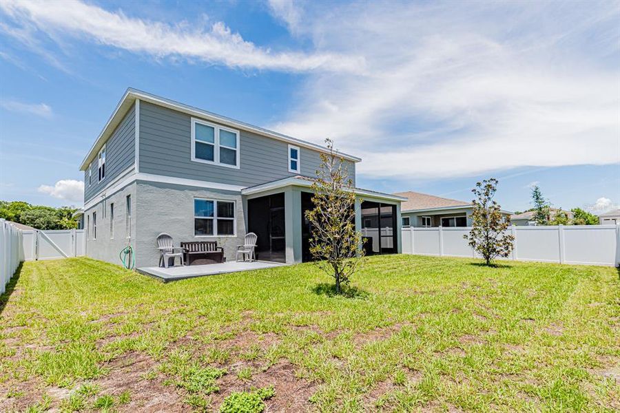 Front exterior of a new home in Seasons at Lakeside Forest, Tavares, FL, highlighting curb appeal (Image 28).