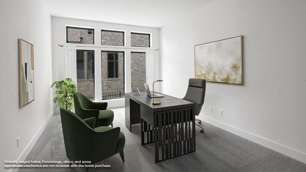 Full bathroom featuring vanity, a freestanding bath, a shower stall, vaulted ceiling, and baseboards