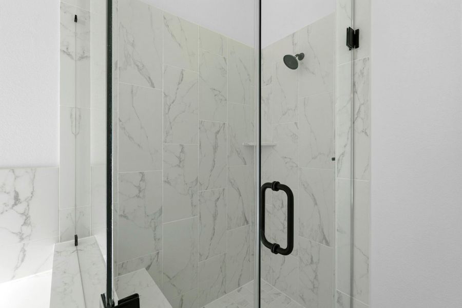 Enjoy the best of both worlds with a separate soaking tub for relaxation and a walk-in glass shower for convenience.