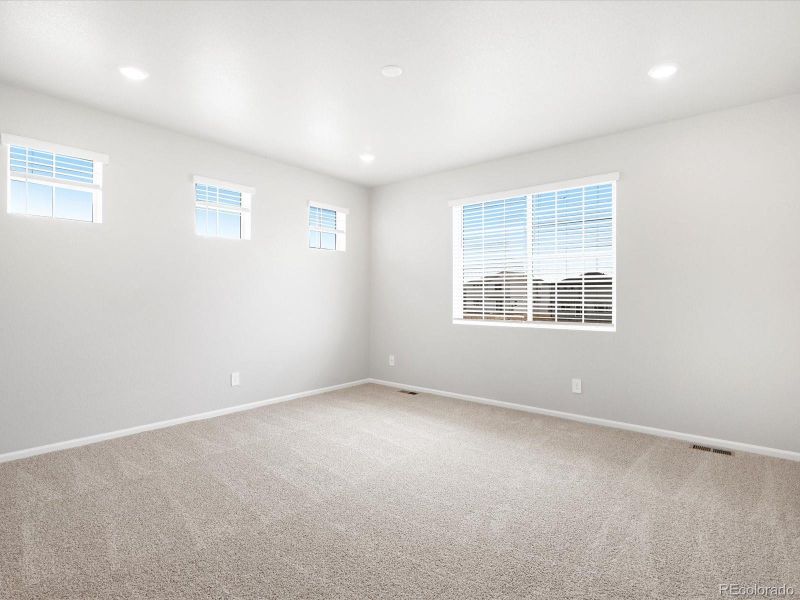 Spacious, unfurnished interior of a new home in Buffalo Highlands: The Canyon Collection, Commerce City (Image 24).