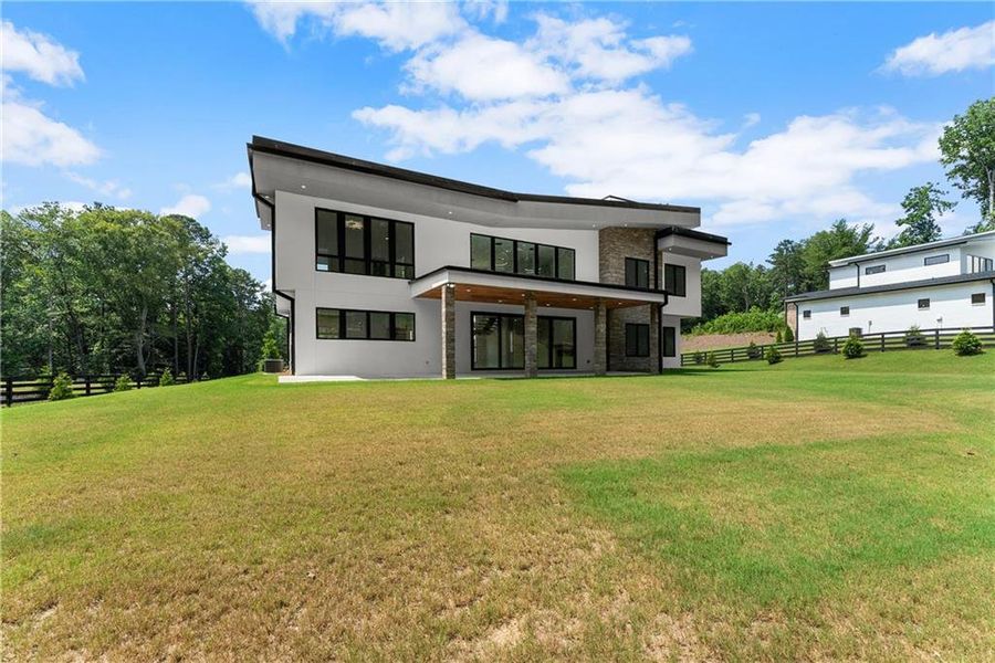 Front exterior of a new home in , Hoschton, GA, highlighting curb appeal (Image 25).