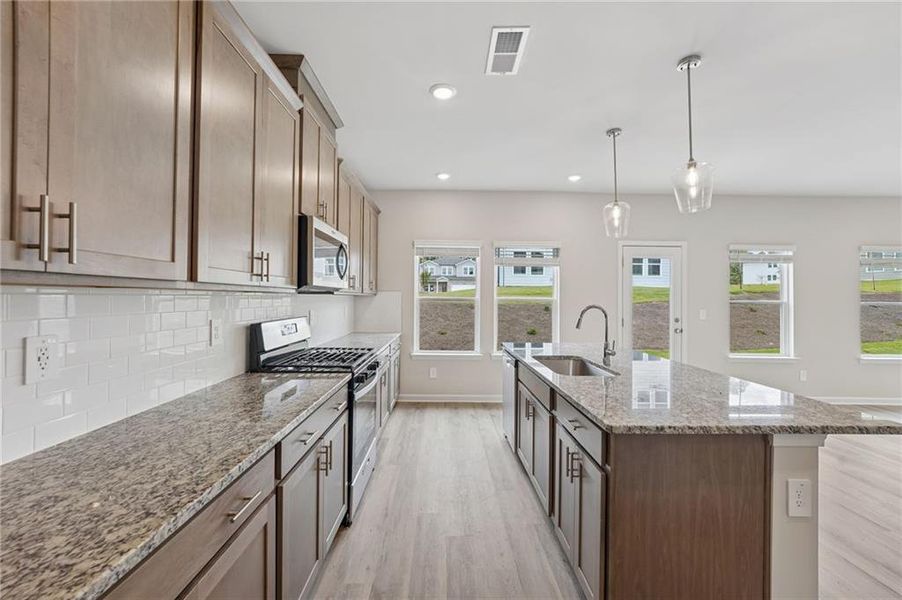 Furnished interior view inside a new home in Northwoods at Mirror Lake, Villa Rica (Image 8).