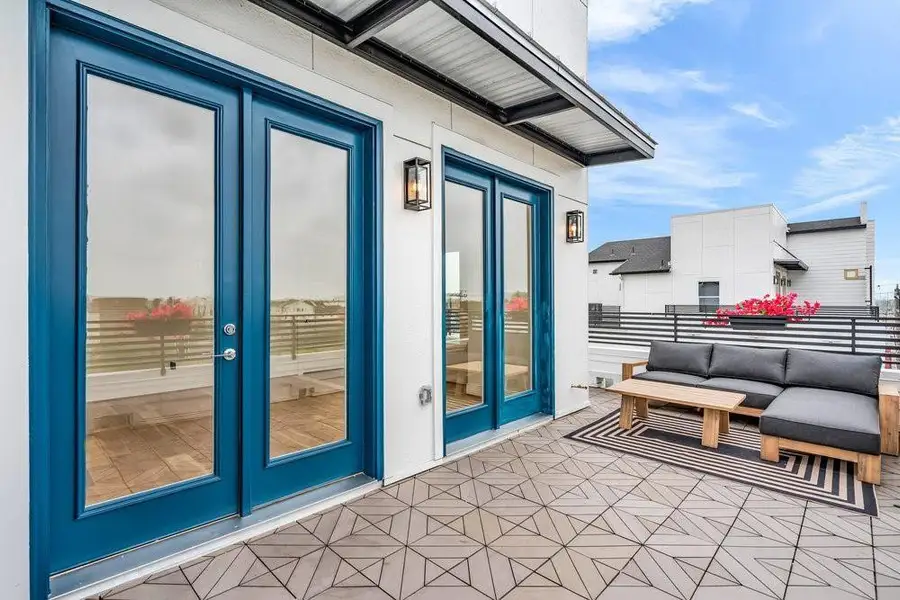 Exterior details and patio area of a home in , Houston (Image 2). Exterior details and patio area of a home in , Houston (Image 2).