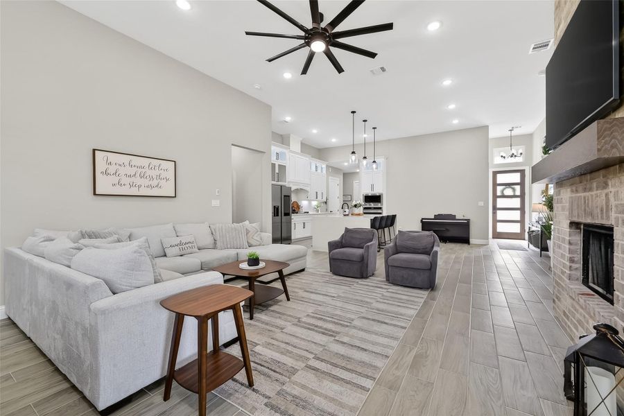 Great room highlighting high ceilings and open-concept design. Great room highlighting high ceilings and open-concept design.