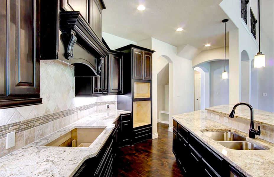 Representative furnished interior of a home built from the 4198 by Ravenna Homes in The Woodlands Hills 65′, Willis (Image 7).