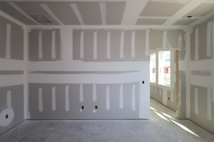 In-progress construction of a new home in Eden at Crossprairie, St. Cloud, FL (Image 18).