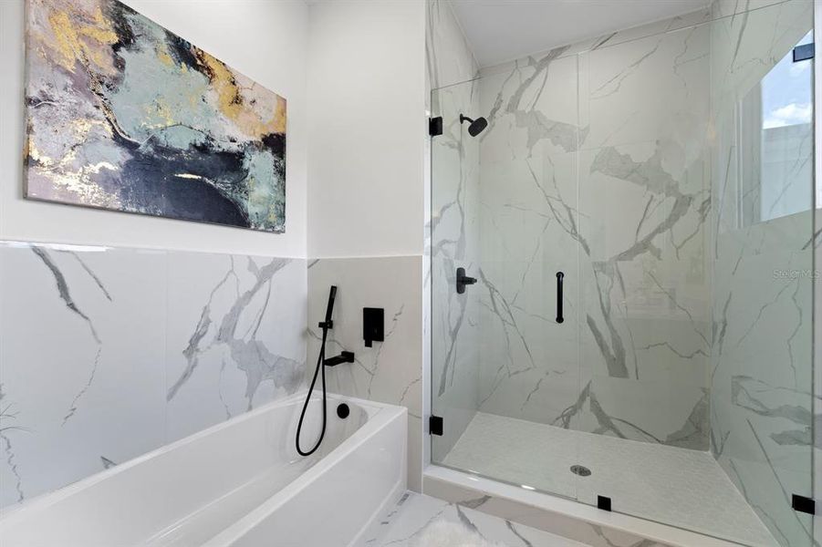 Furnished interior view inside a new home in On Villa Pass, Mascotte (Image 11). Furnished interior view inside a new home in On Villa Pass, Mascotte (Image 11).