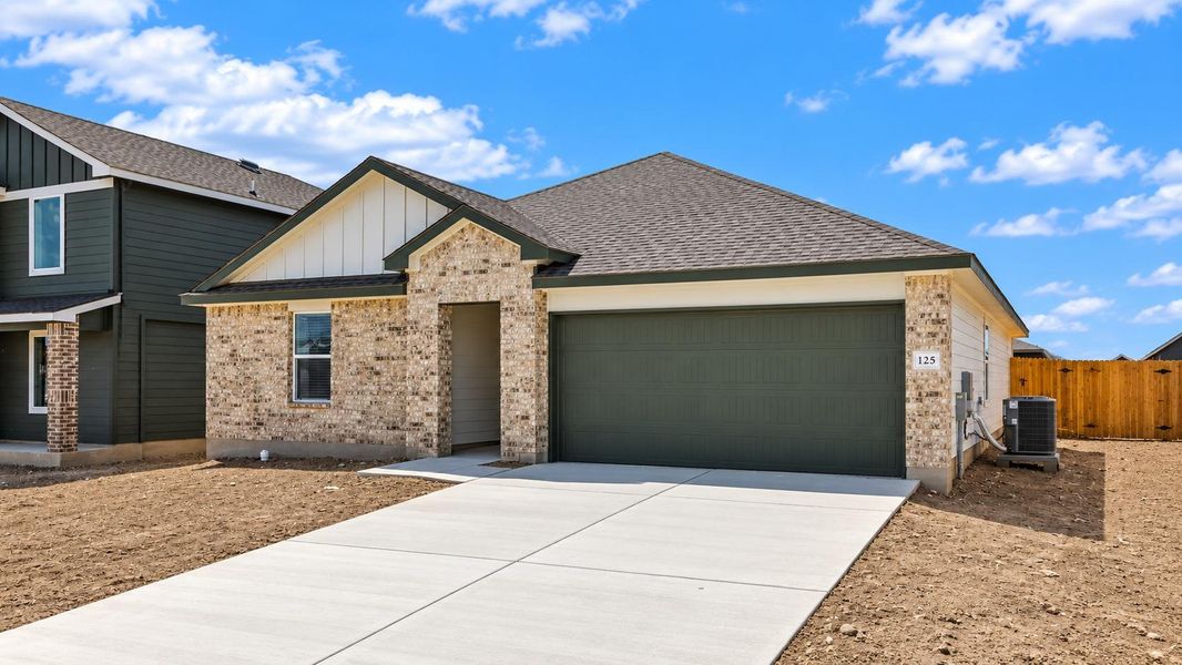 Front exterior of a new home in Eastern Wells, Jarrell, TX, highlighting curb appeal (Image 14).