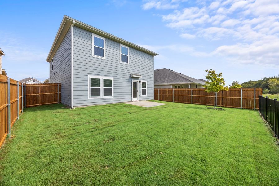 A house with a fence around it.