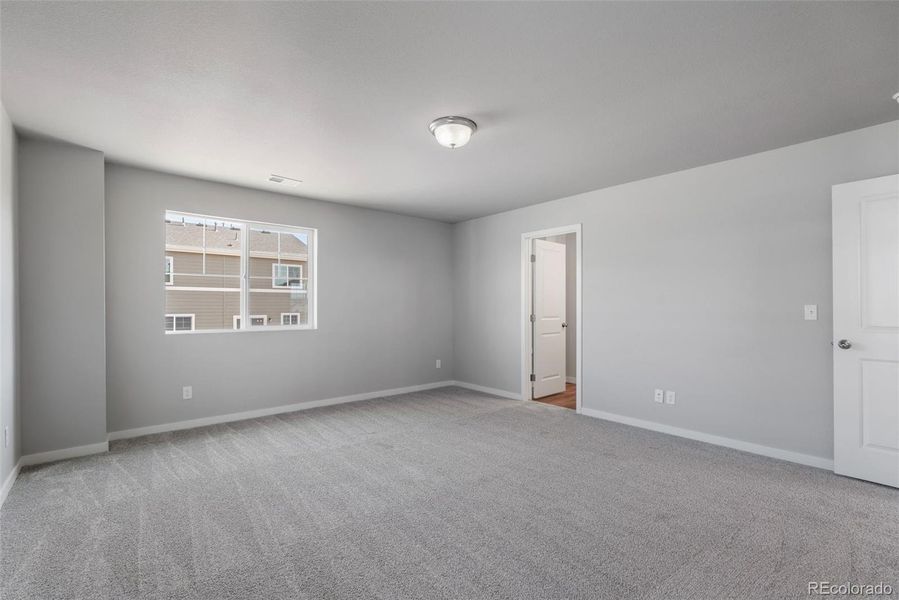 Spacious, unfurnished interior of a new home in Sky Ranch – Uptown Collection, Watkins (Image 23).