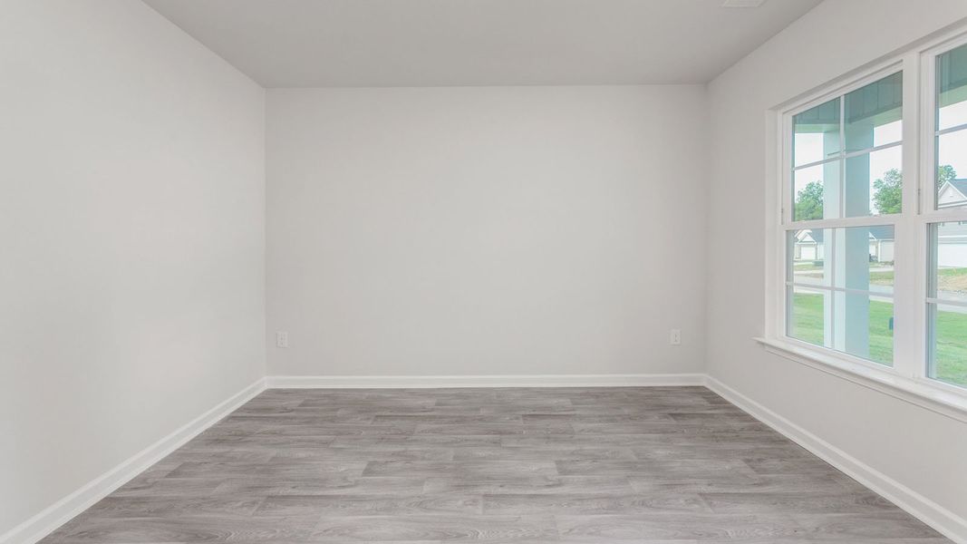 Representative unfurnished interior of a home built from the PENWELL by D.R. Horton in English Farm, Archdale (Image 9).