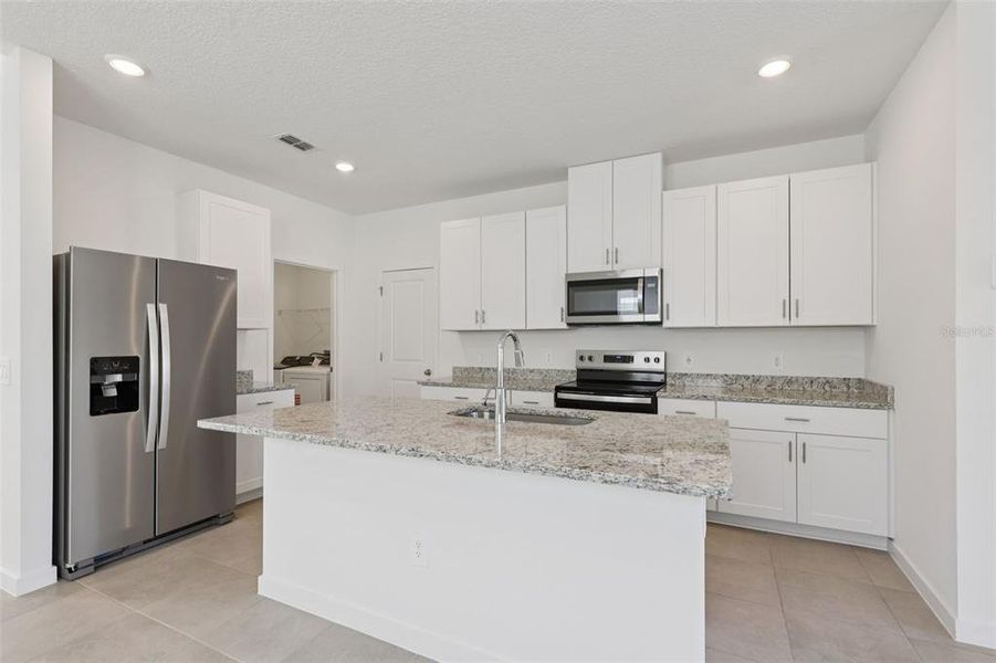 Furnished interior view inside a new home in Flagler Village - Classic Series, Palm Coast (Image 8).