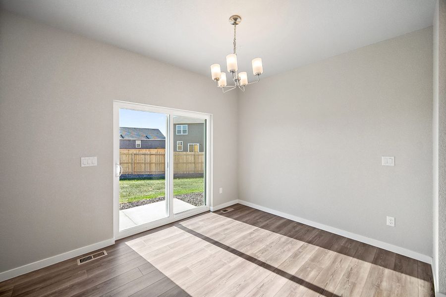 Spacious, unfurnished interior of a new home in The Glen, Colorado Springs (Image 25).