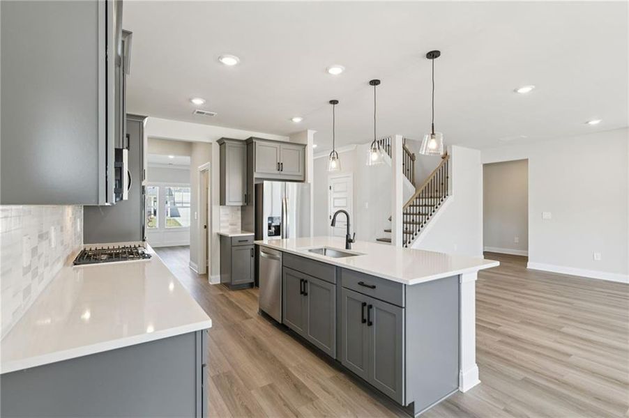 Furnished interior view inside a new home in Vines at Mill Creek - Estate Series, Braselton (Image 13).