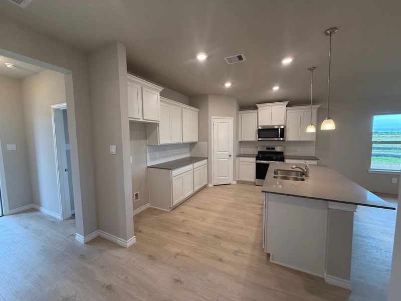 Furnished interior view inside a new home in Southern Pointe, College Station (Image 4). Furnished interior view inside a new home in Southern Pointe, College Station (Image 4).
