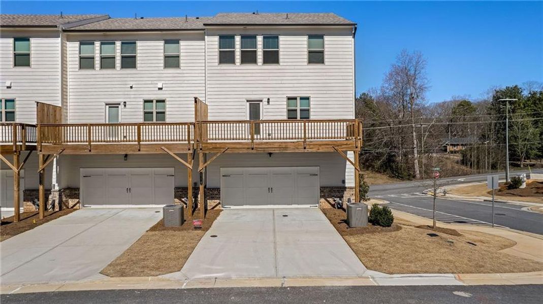 Front exterior of a new home in , Marietta, GA, highlighting curb appeal (Image 1).