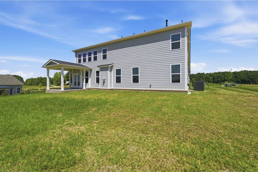 Exterior details and patio area of a home in Aden Woods, Fairview (Image 25).
