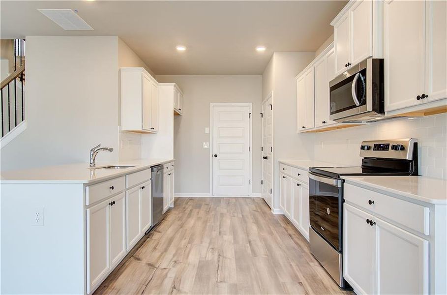 Furnished interior view inside a new home in Berkeley Lakes, Locust Grove (Image 10).