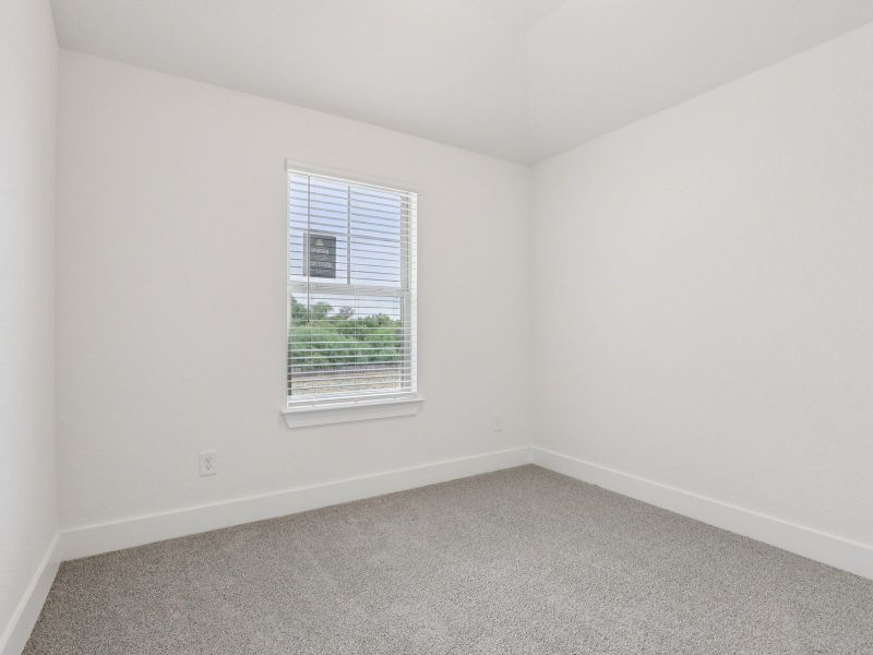 Secondary bedroom in the Callaghan floorplan at a Meritage Homes community.