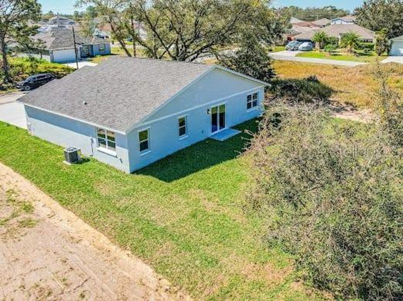Front exterior of a new home in , Kissimmee, FL, highlighting curb appeal (Image 16). Front exterior of a new home in , Kissimmee, FL, highlighting curb appeal (Image 16).