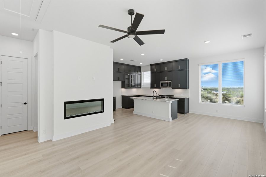 Furnished interior view inside a new home in Centero at Stone Oak, San Antonio (Image 6).
