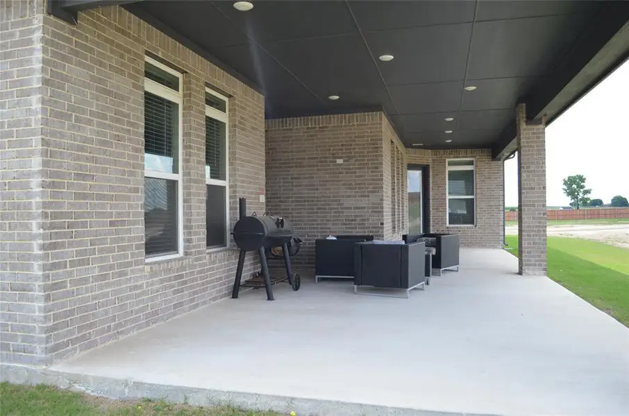 Exterior details and patio area of a home in , Waxahachie (Image 24). Exterior details and patio area of a home in , Waxahachie (Image 24).