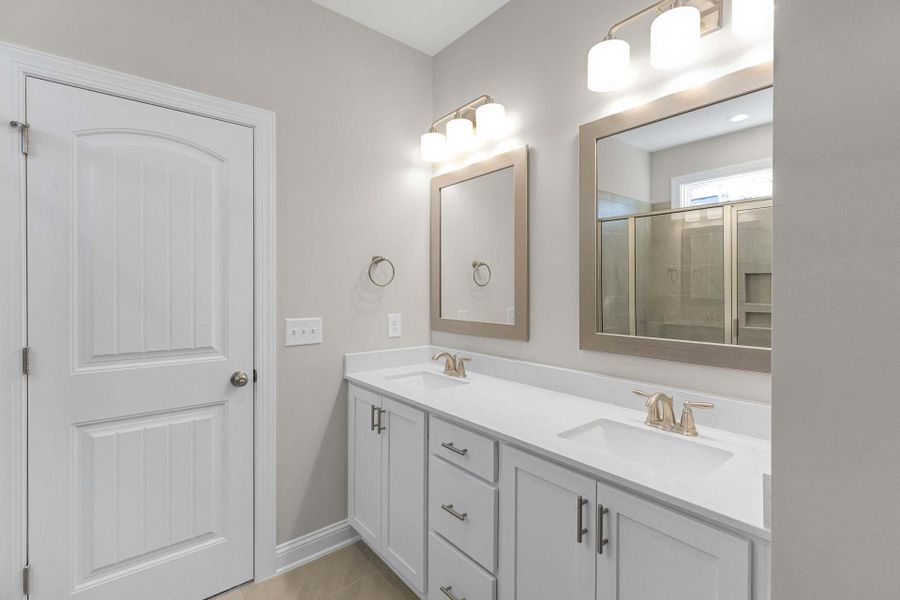 Representative furnished interior of a home built from the Garland by Caviness & Cates Communities in Bartlett Manor, Youngsville (Image 216). Representative furnished interior of a home built from the Garland by Caviness & Cates Communities in Bartlett Manor, Youngsville (Image 216).