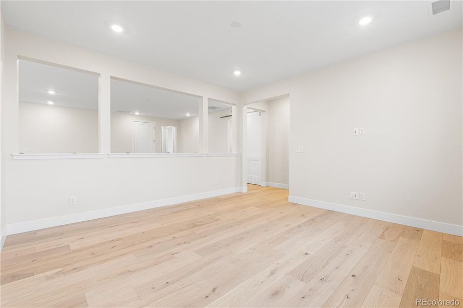 Spacious, unfurnished interior of a new home in Luxe at The Canyons, Castle Pines (Image 36).