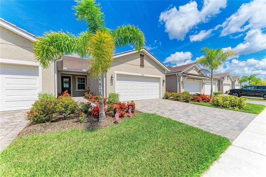 Front exterior of a new home in , Venice, FL, highlighting curb appeal (Image 1). Front exterior of a new home in , Venice, FL, highlighting curb appeal (Image 1).